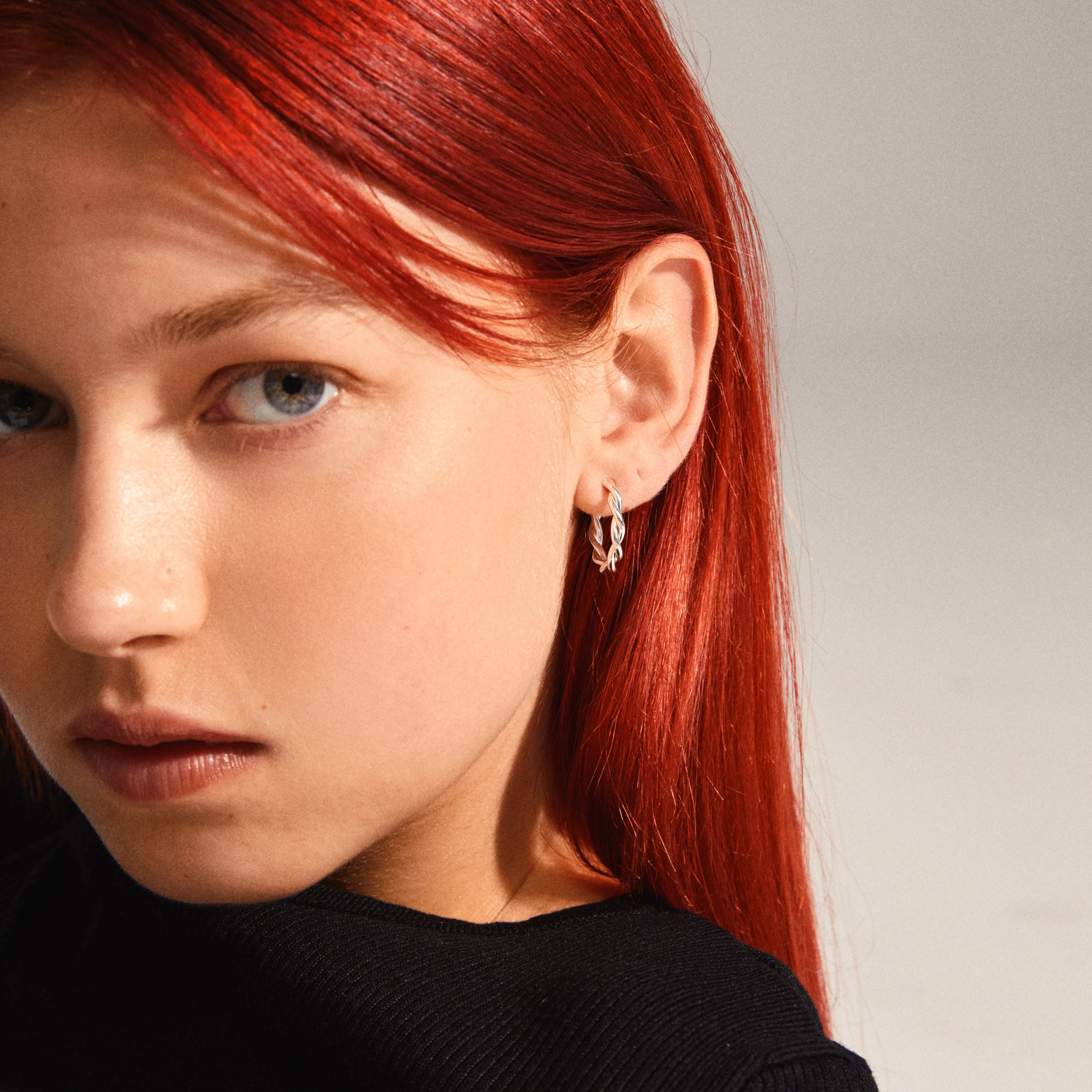 NAJA twisted hoop earrings silver-plated