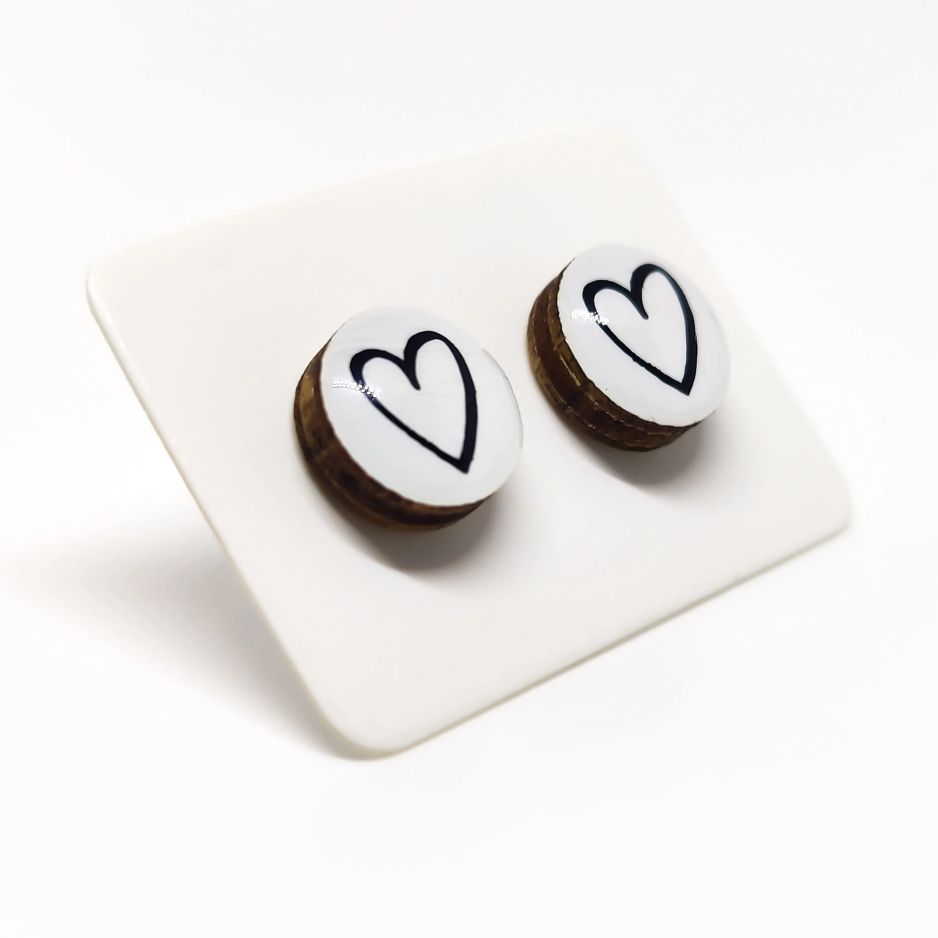 White & Black Hand Drawn Heart Stud Earrings by Candi Cove Designs