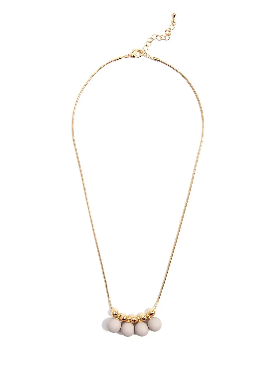 Zenzii Shiny Metal Necklace With Painted Metal Circle